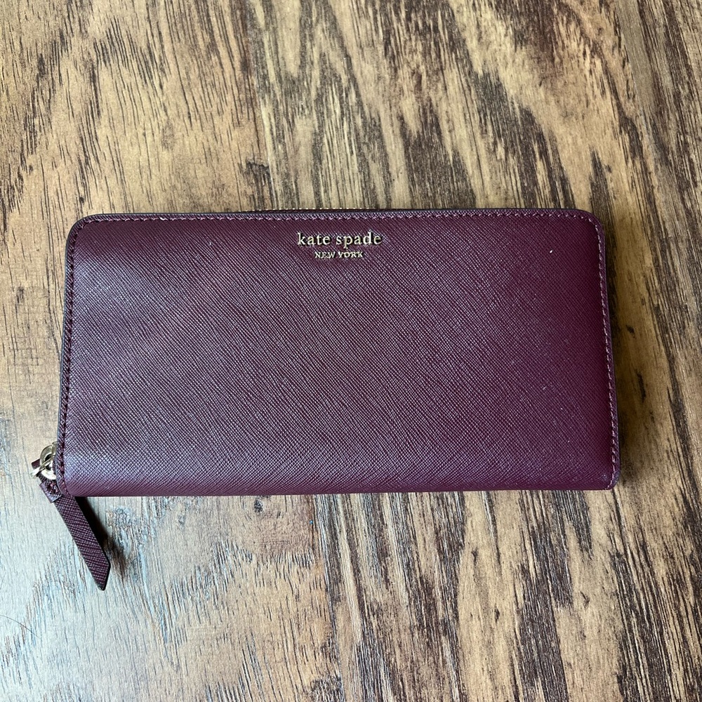 Kate Spade- Ava Zip Around Continental Wristlet